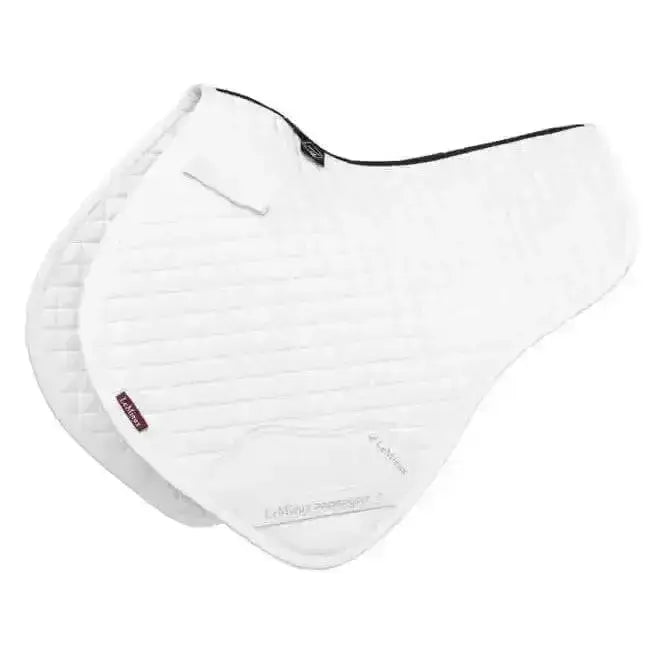 White quilted lemieux cotton close contact half square white saddle pad with black trim and small brand tag