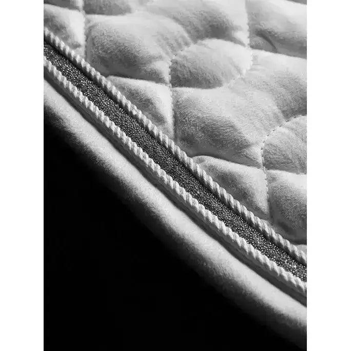 White quilted lemieux crystal suede close contact square with plush texture and decorative edge stitching