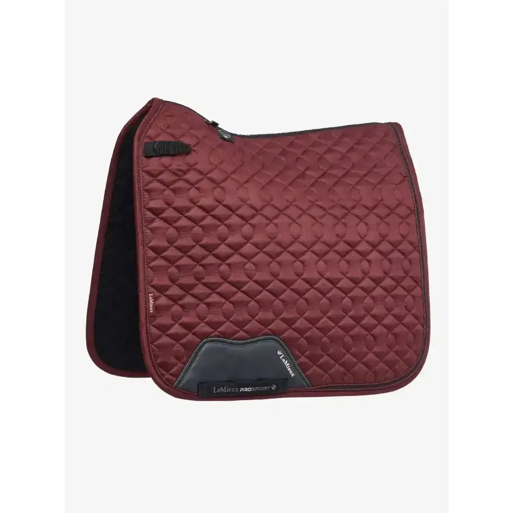 Maroon lemieux crystal suede quilted dressage pad with black accents and branded label for equestrian use