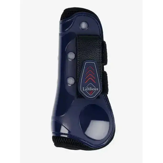 Navy blue lemieux derby projump tendon boot with black straps and silver accents for horse leg support