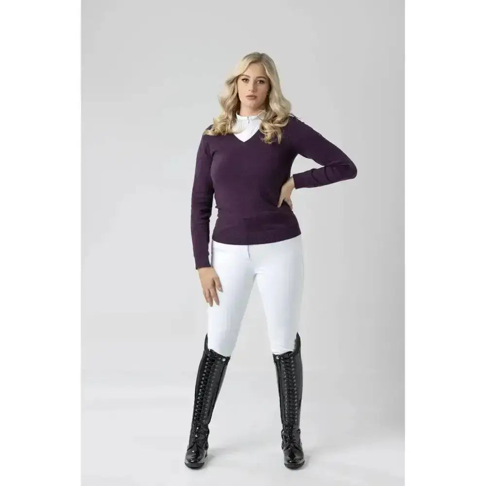 Purple v-neck long-sleeved sweater over white shirt paired with lemieux drytex waterproof breeches with knee grip