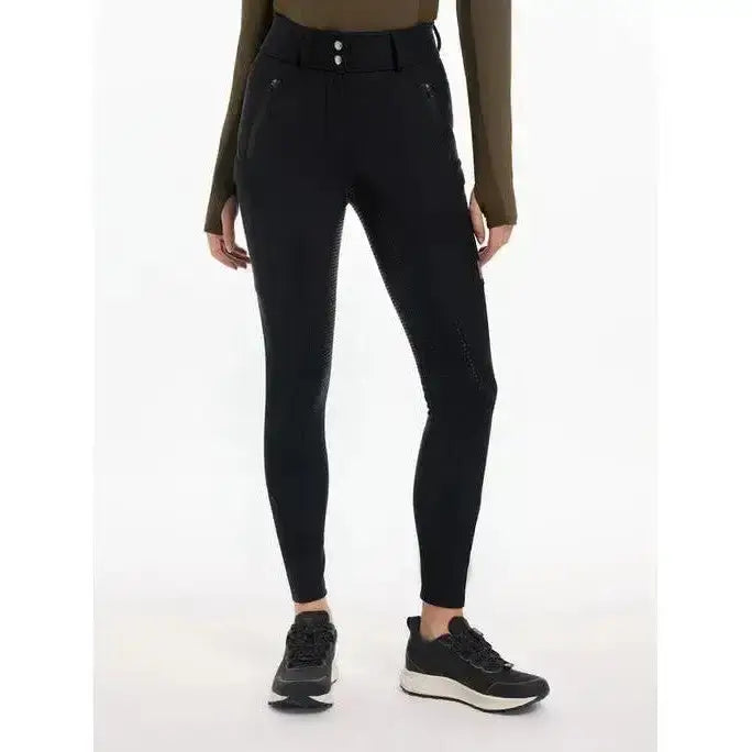Black lemieux drytex waterproof breeches with high waist, textured panels, and front buttons for all-weather riding