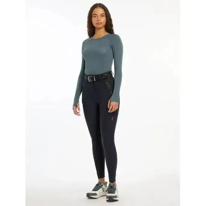 Black lemieux drytex waterproof breeches with sleek fit and subtle red branding for all-weather riding use