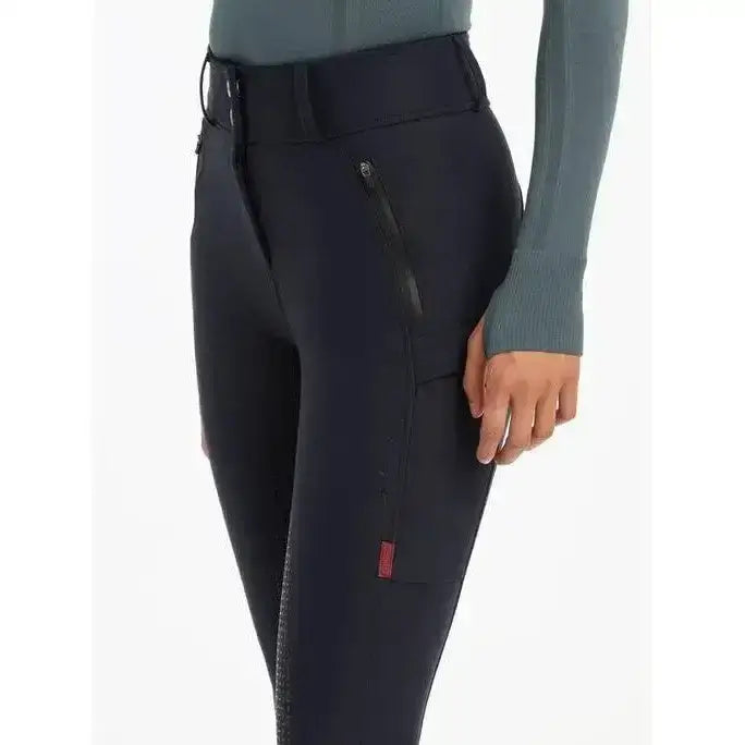 Black lemieux drytex waterproof breeches with sleek fit and subtle textured side panels for all-weather riding