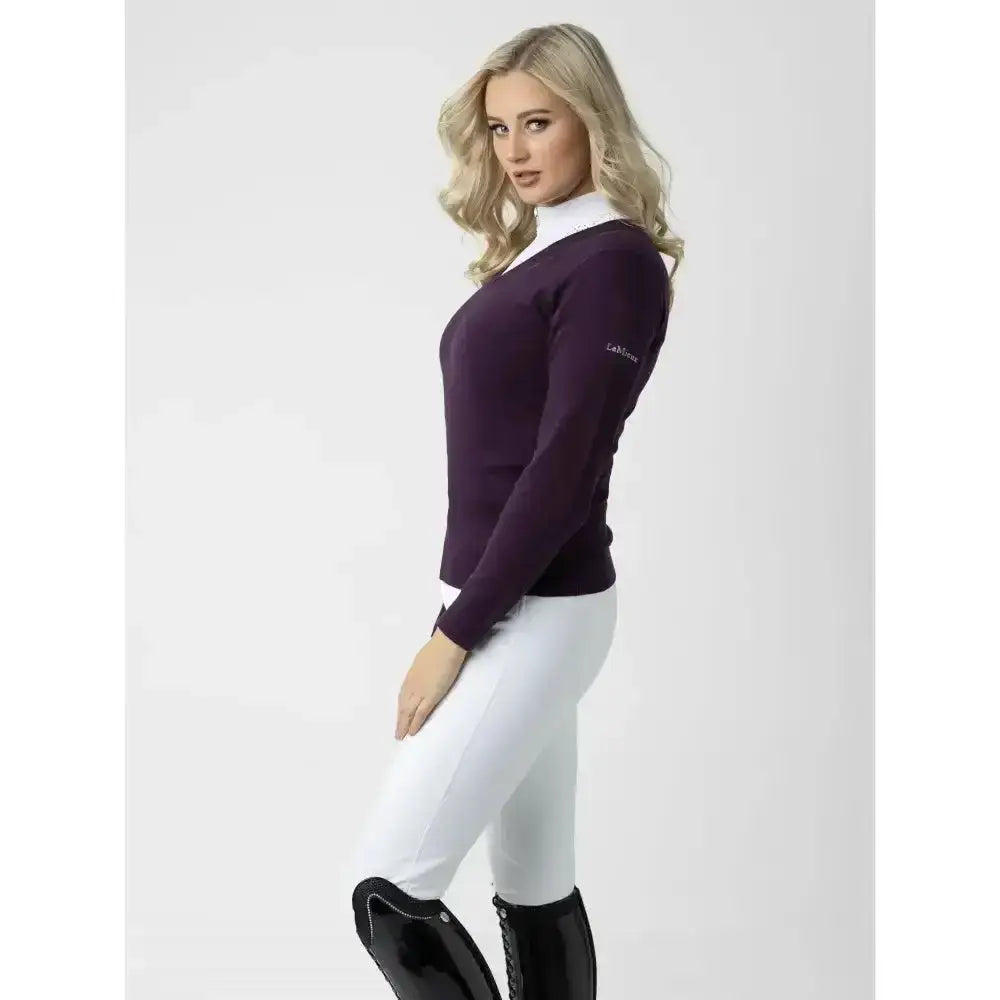 A deep purple long-sleeved equestrian top with a subtle logo paired with lemieux drytex waterproof breeches white