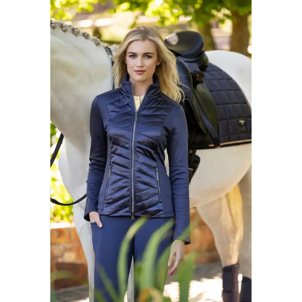 Navy blue quilted zip front riding jacket perfect for riding the lemieux dynamique jacket dusk blue