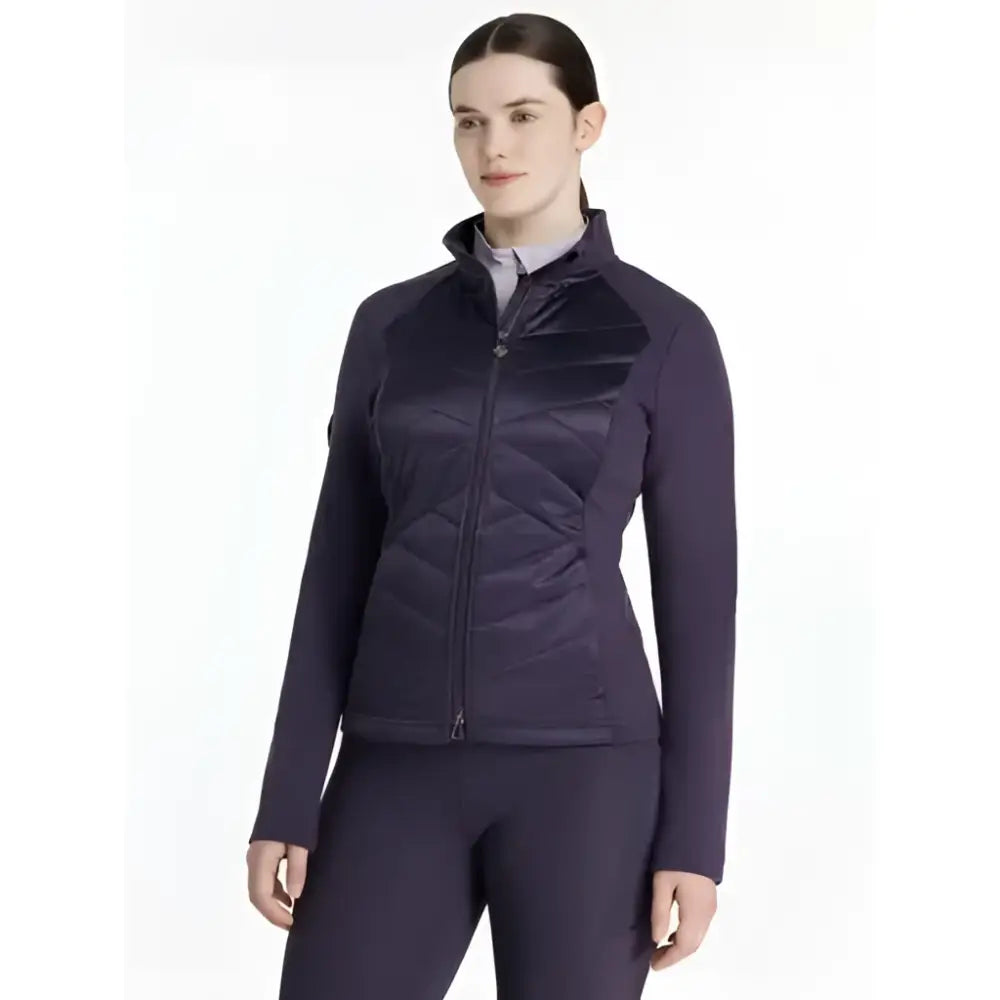 Dark purple quilted lemieux dynamique jacket with high collar and full-length zipper in the juniper collection