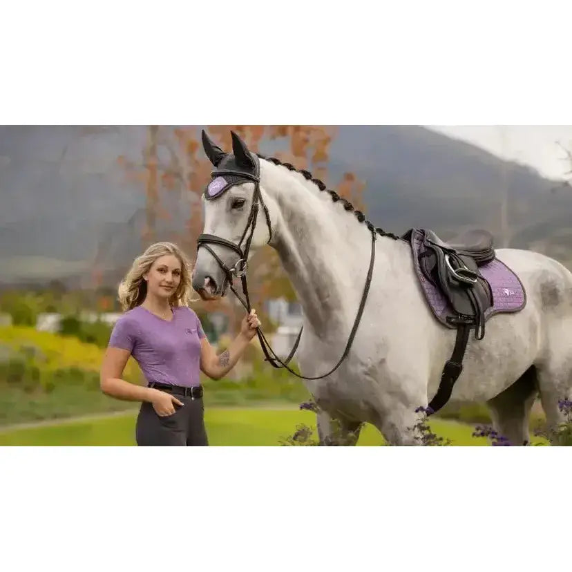 Purple and black lemieux earth purpose saddle pad with matching square thistle saddle for everyday riding