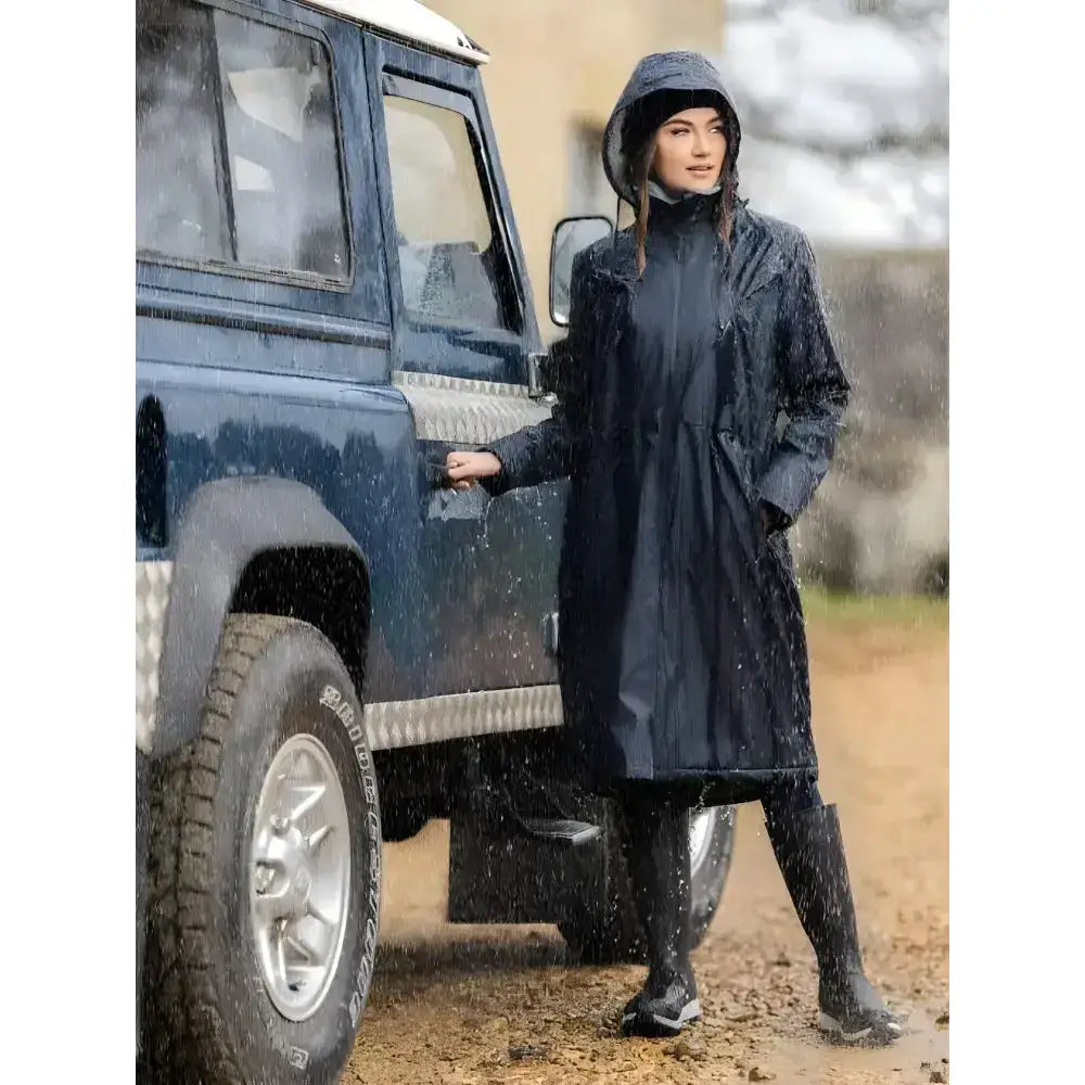 Black hooded lemieux elements coat with full-length waterproof design and welded seams featuring reflective trim
