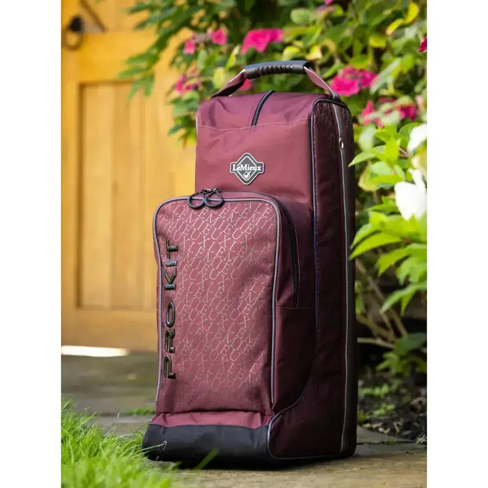 Maroon and black lemieux elite pro boot and hat bag burgundy with subtle repeating logo pattern to maximise space