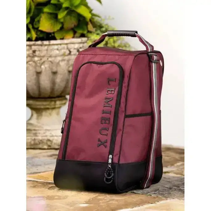 Maroon and black lemieux elite wellington boot bag burgundy with zipper pockets and top handle for easy carry