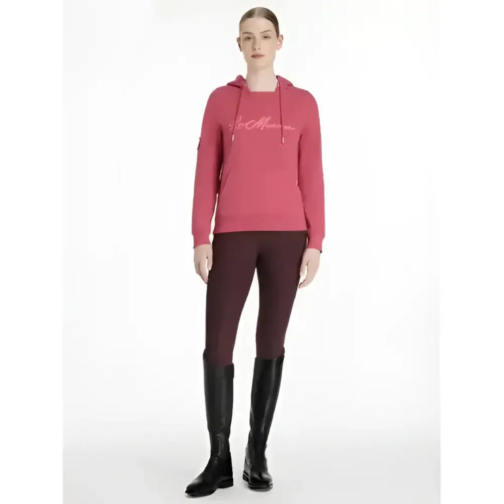 A pink long-sleeved lemieux elspeth hoodie cranberry with a subtle cursive logo across the chest