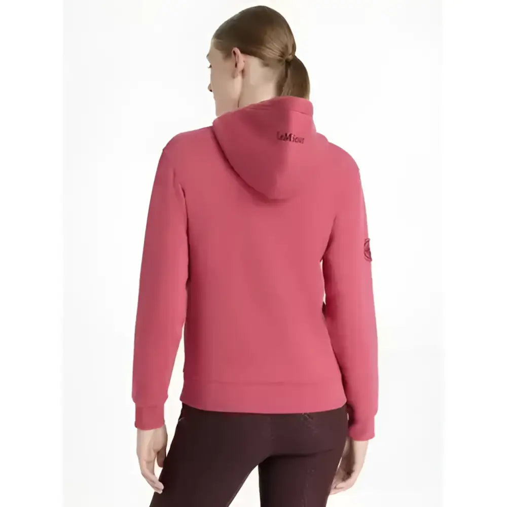 Back view of lemieux elspeth hoodie cranberry in soft textured pink fabric with subtle branding on the back