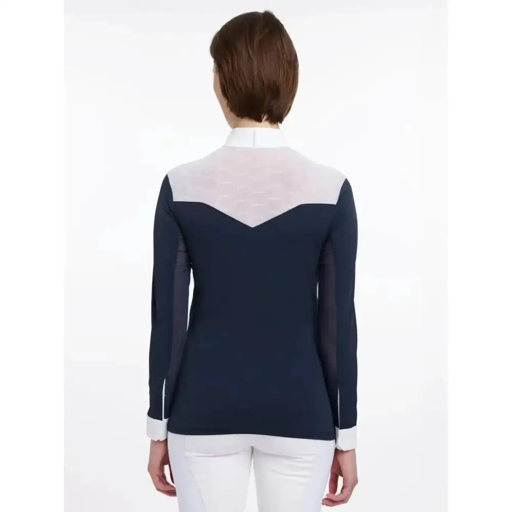 Back view of lemieux emily long sleeve navy shirt with sheer paneling on the blouse perfect for shows
