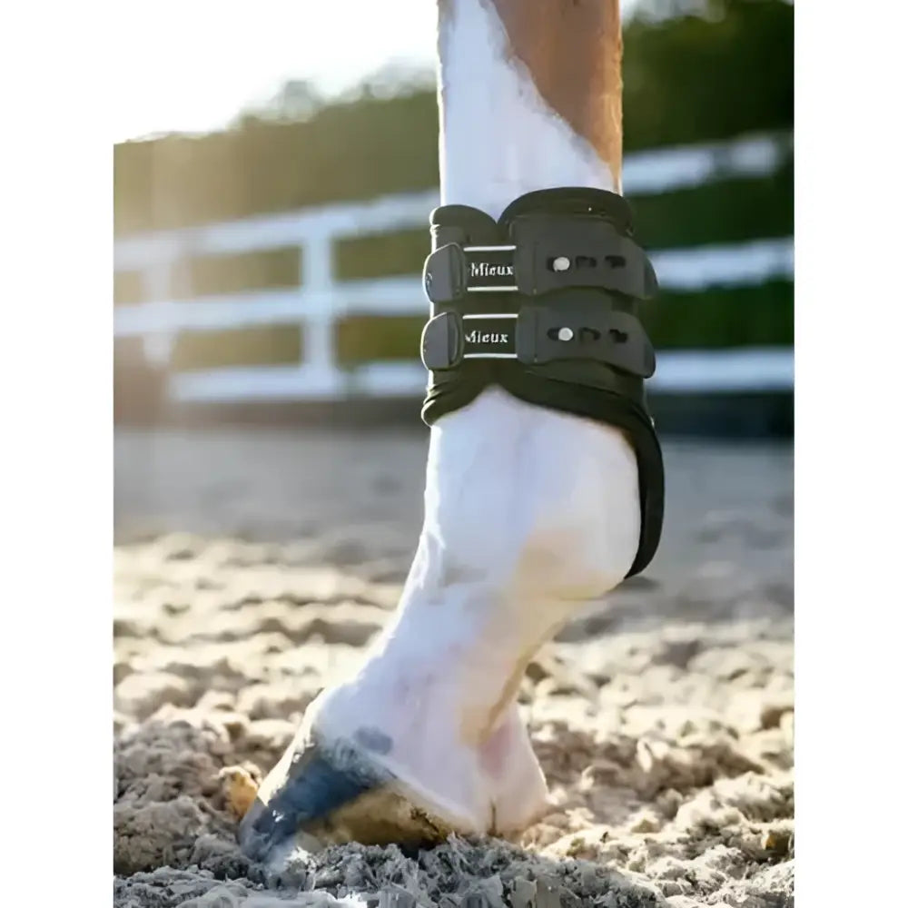 Black lemieux exo-flex® horse hoof boot with three adjustable straps and expertly designed fusion for fetlock support