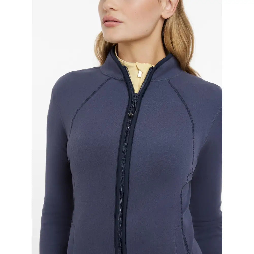 Navy blue lemieux faye fleece zip jacket with subtle seams and gold-toned zipper pull in dusk blue color