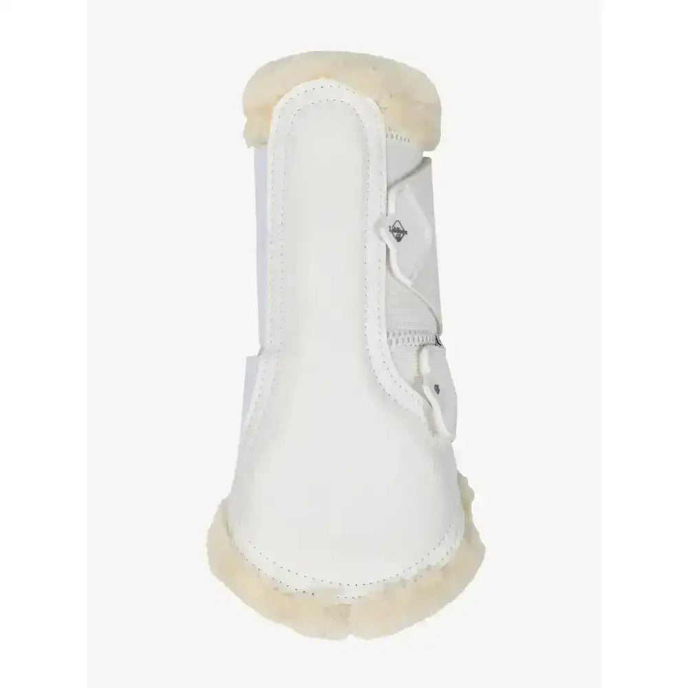 White leather lemieux fleece edged mesh brushing boot with cream shearling lining and silver buckle