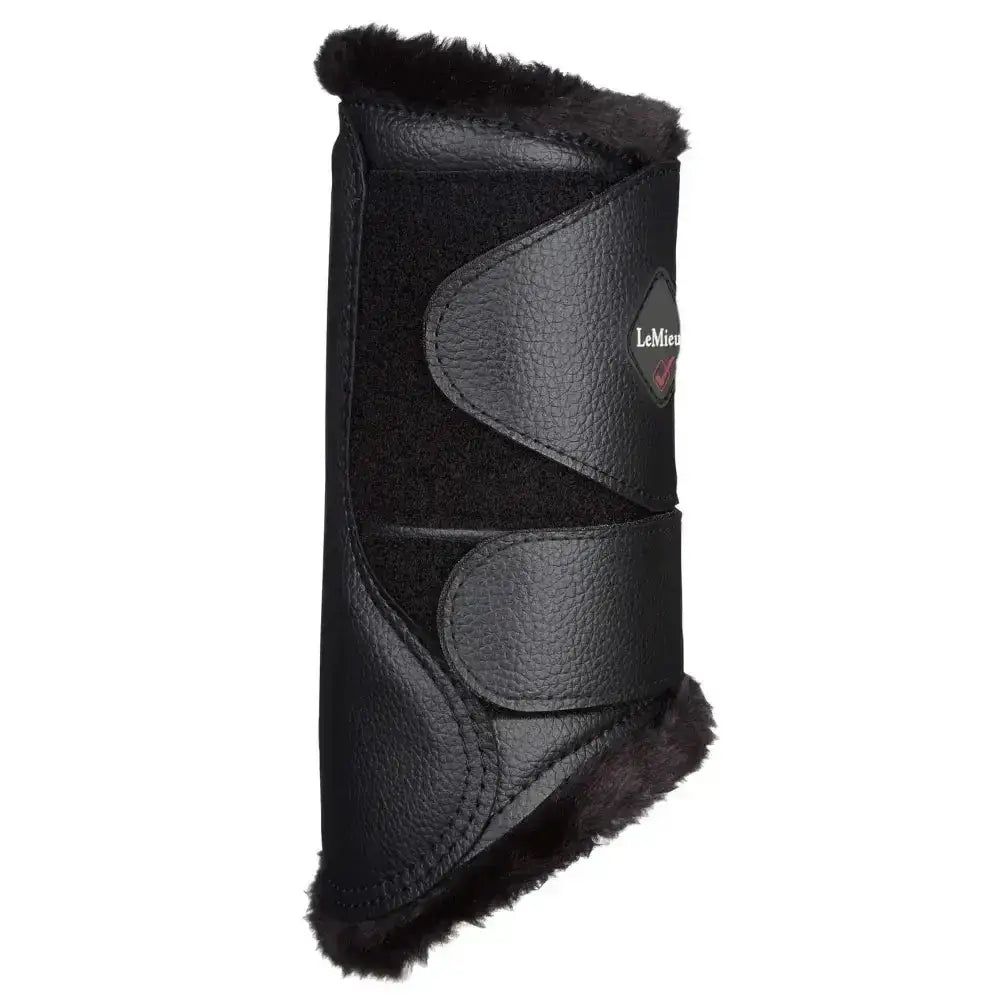 Black leather lemieux fleece lined brushing boots with plush fur trim and logo patch beautifully fitting brushing boots