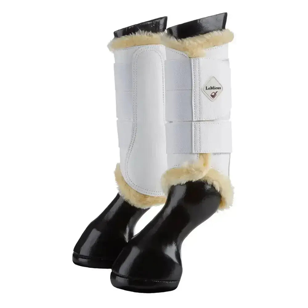White lemieux fleece lined brushing boots with black hoof protection and cream fleece trim for a beautiful fit