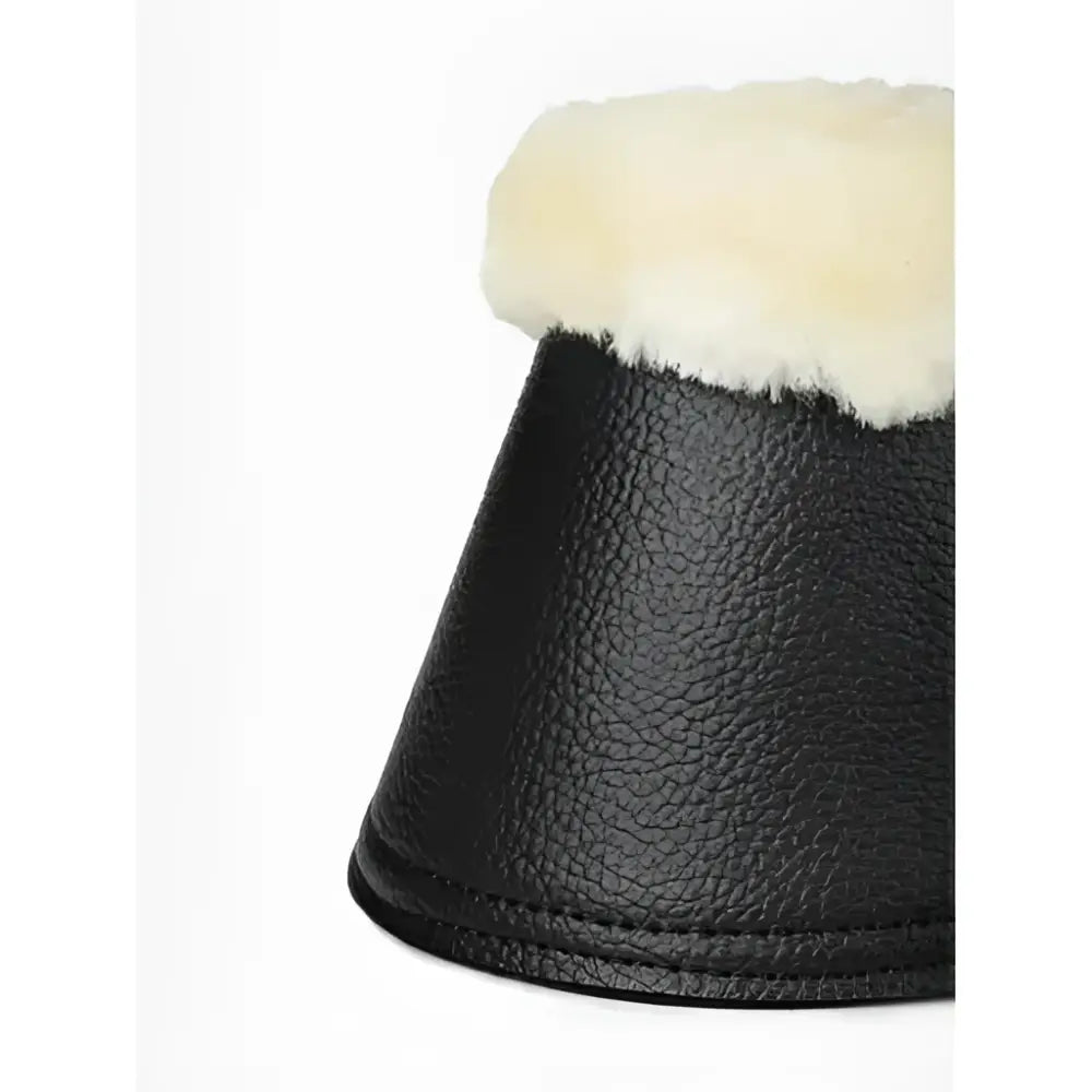 Black faux leather lemieux fleece wrapround reach boots with plush cream shearling lining in black and natural color