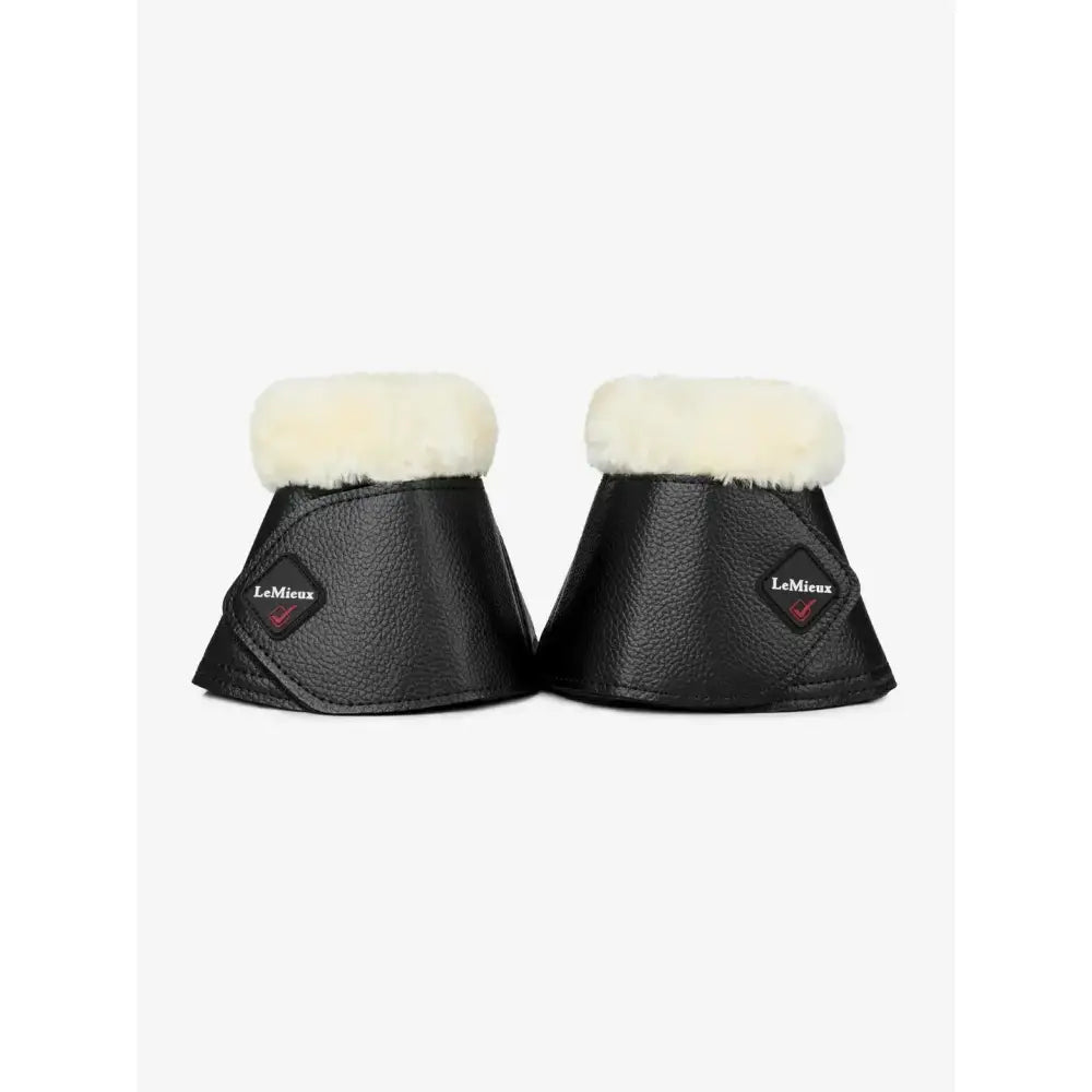 Black lemieux fleece wrapround reach boots with cream fleece lining and faux leather overreach design