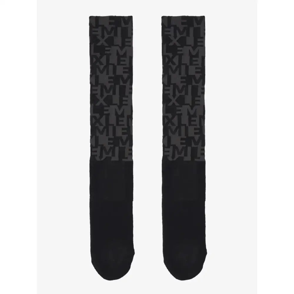 Black lemieux footsie socks with dark gray repeating monogram pattern perfect for stylish everyday wear
