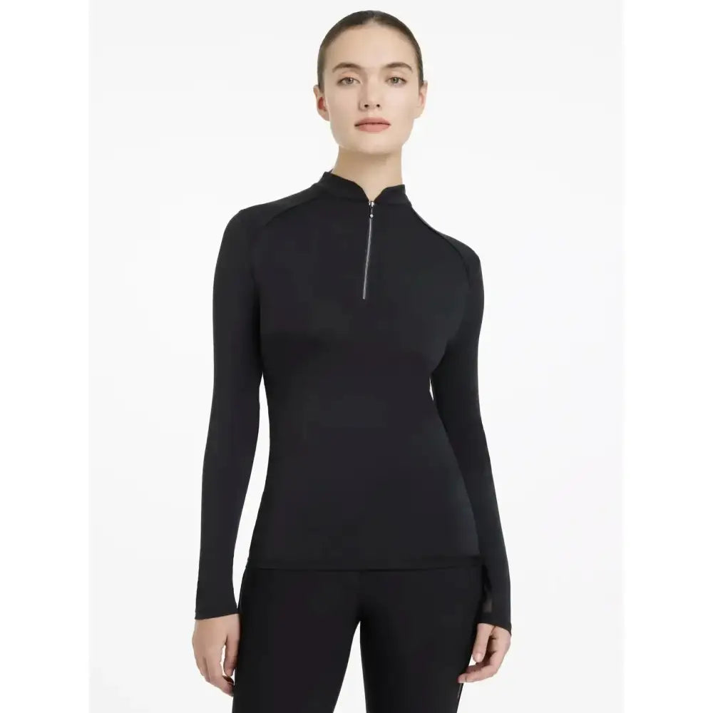 Black long-sleeved athletic top with quarter-zip neckline lemieux heyden lightweight base layer for active wear