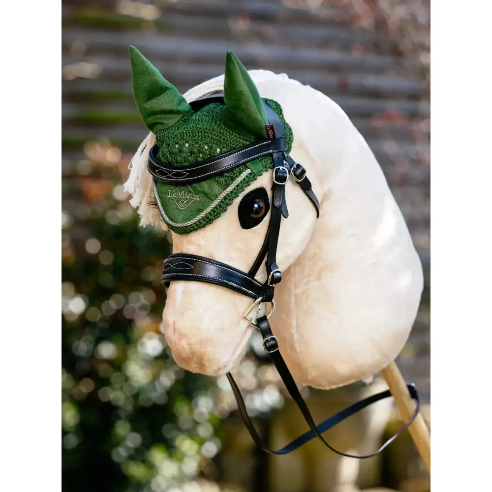 Green crocheted lemieux hobby horse fly hood hunter with embroidered logo and black leather straps