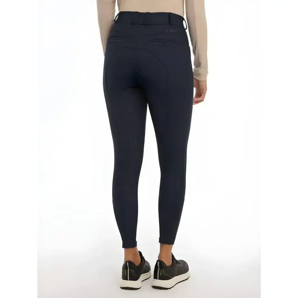 Navy blue lemieux isabelle seat breeches with a sleek fit and tonal reflective details perfect for riding