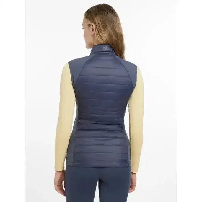 Navy blue quilted sleeveless puffer vest with high collar lemieux juliette gilet dusk blue for cool weather layering