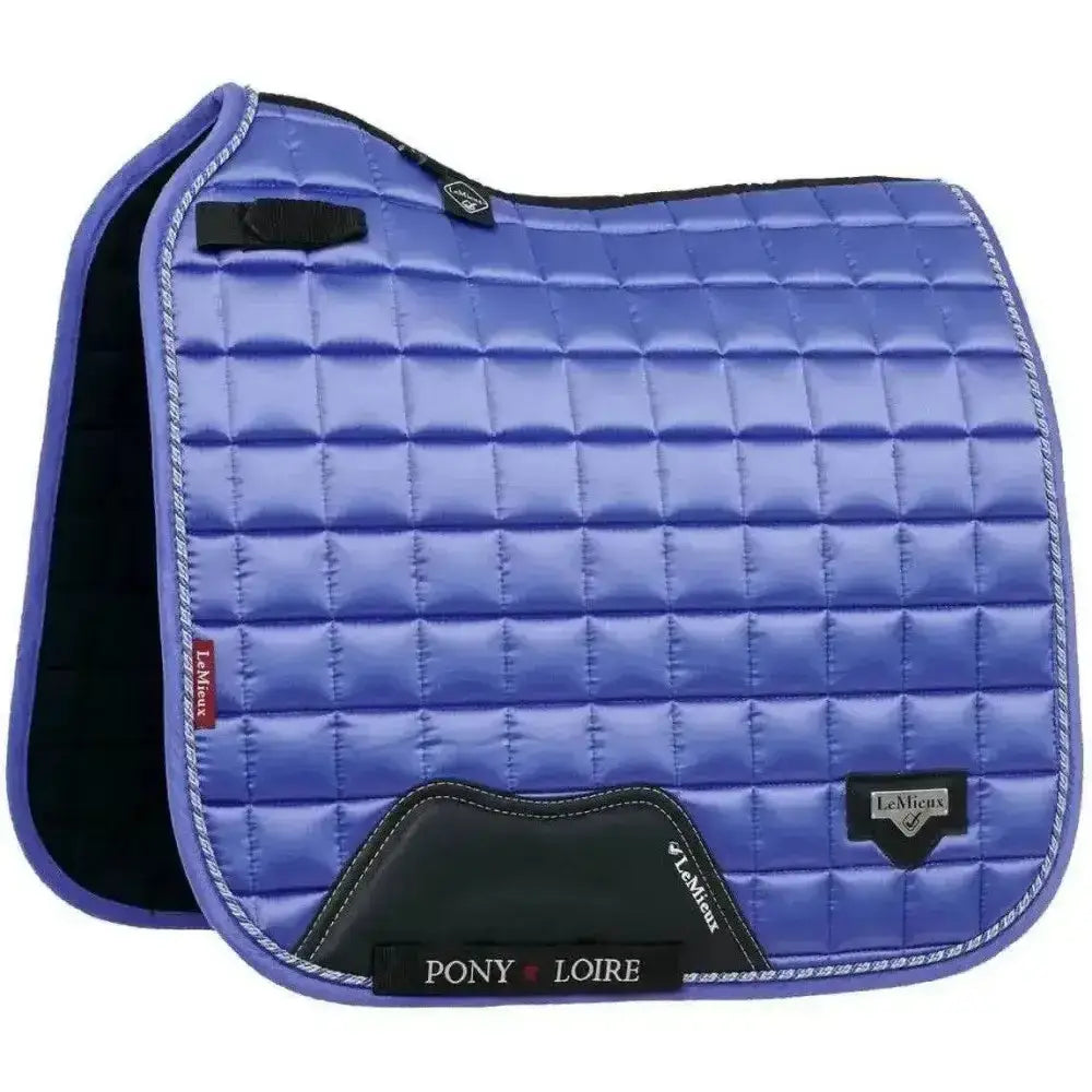 Blue quilted lemieux junior loire classic dressage square bluebell saddle pad with black accents and pony loire label