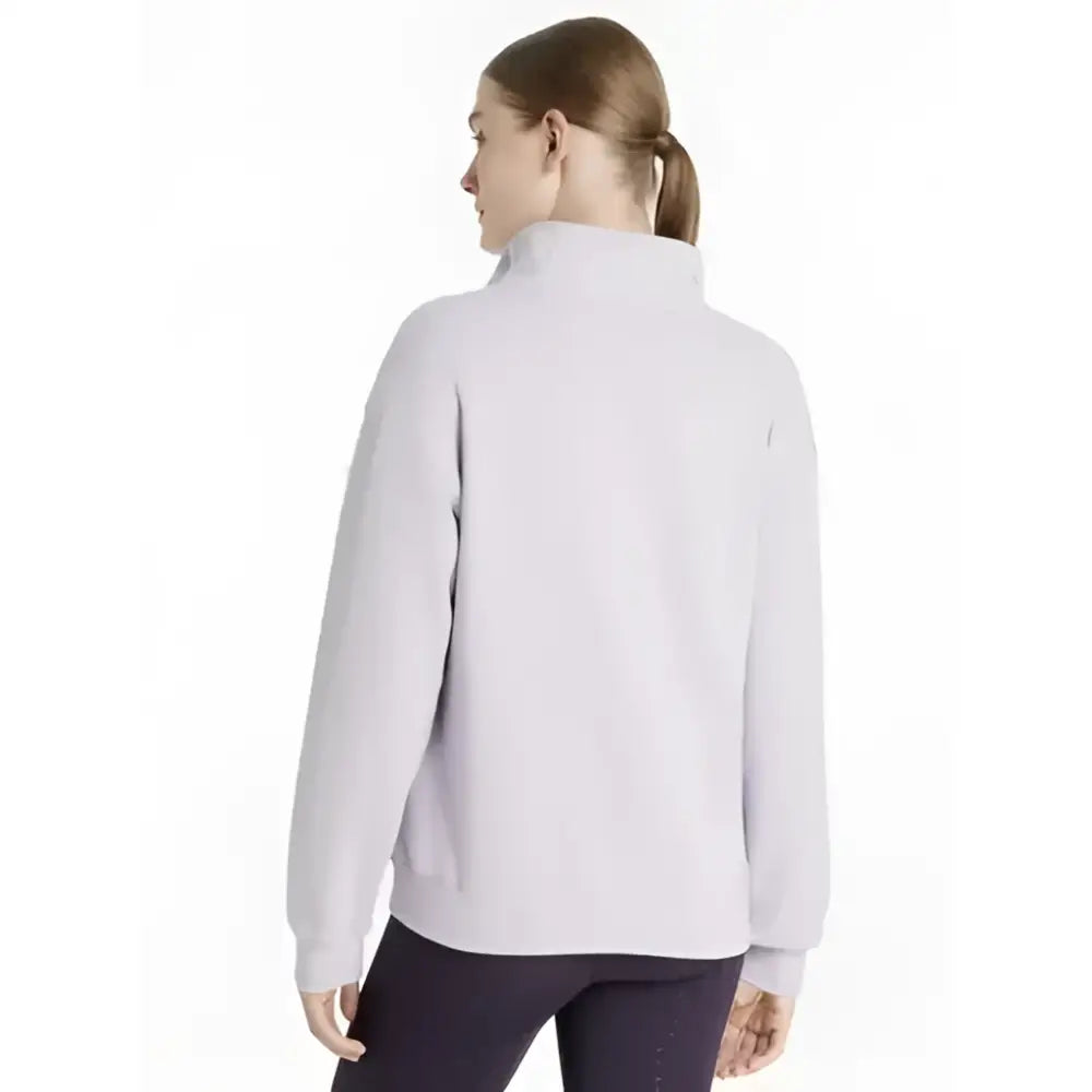 A soft lavender lemieux keira quarter zip sweat lilac fleece jacket with long sleeves high collar and side pockets
