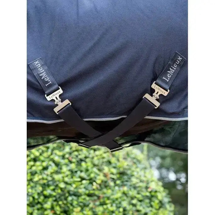 Navy blue lemieux kudos hybrid cooler horse blanket with black adjustable straps and silver metal buckles