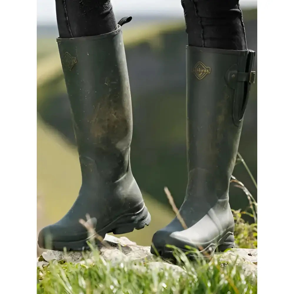 Dark green lemieux ladies stride wellington boots with gold logo side detail in oak color rubber material