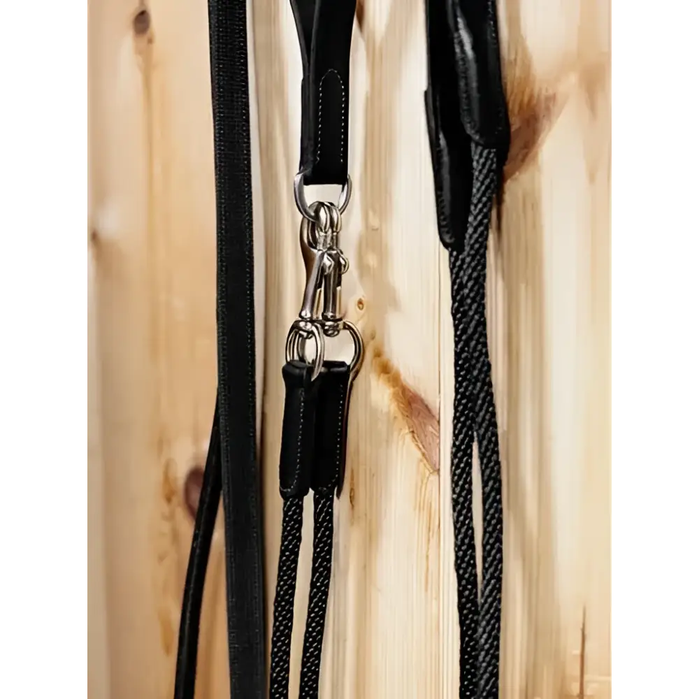 Black leather draw reins with silver hardware and braided rope section lemieux leather draw reins black