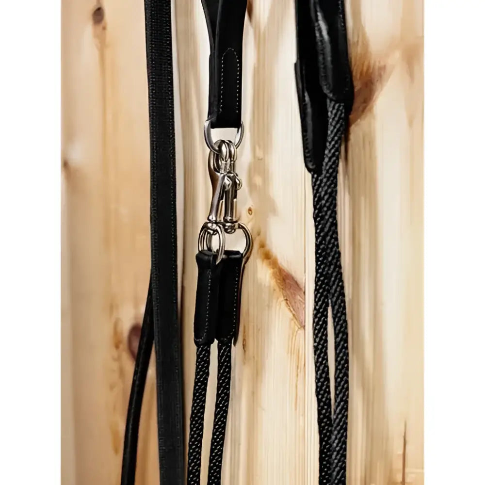 Black leather draw reins with silver hardware and braided rope section lemieux leather draw reins black