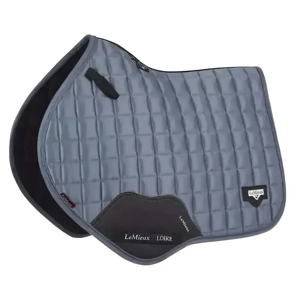 Gray quilted lemieux loire classic close contact square saddle pad with black trim and diamond stitching