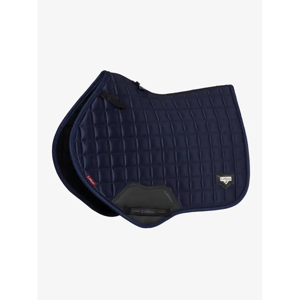 Navy blue quilted lemieux loire classic close contact square saddle pad with black trim and brand logo
