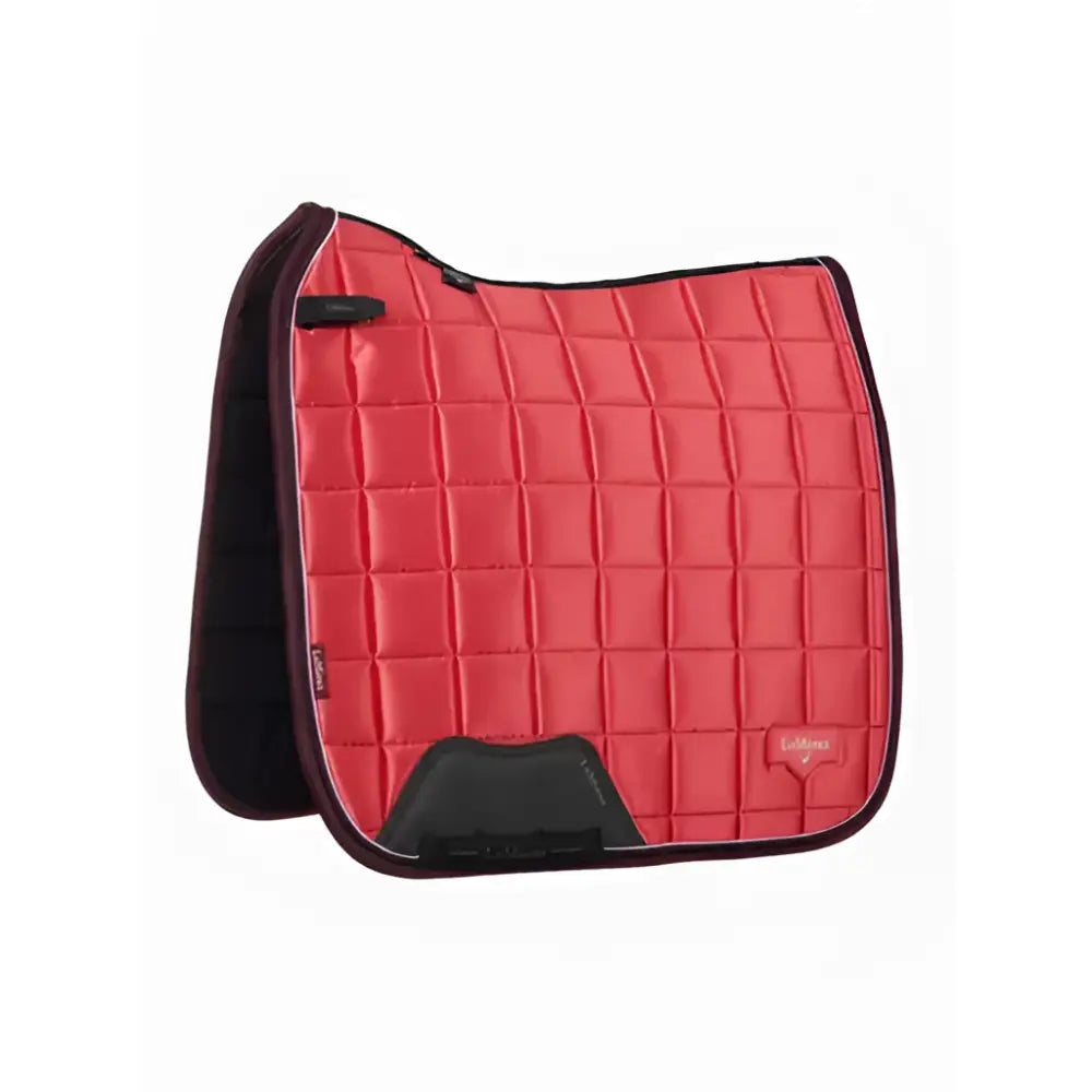 Red quilted lemieux loire classic dressage square cranberry saddle pad with black trim and logo patch