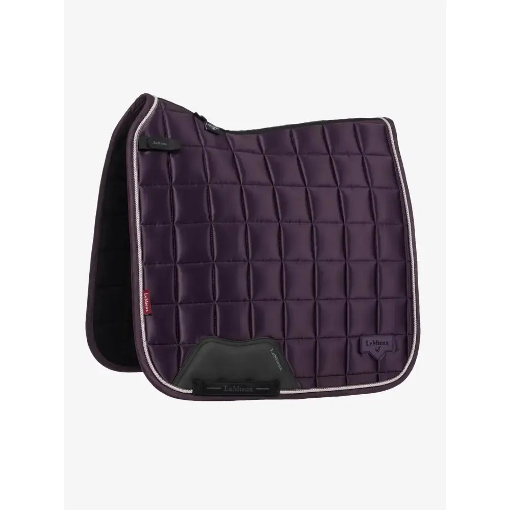 Dark purple quilted lemieux loire classic dressage square juniper saddle pad with black trim and silver stitching