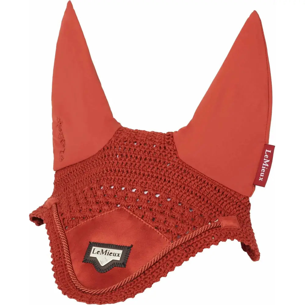 Red crocheted horse ear bonnet with soft fabric ears and satin lining featuring lemieux loire satin label