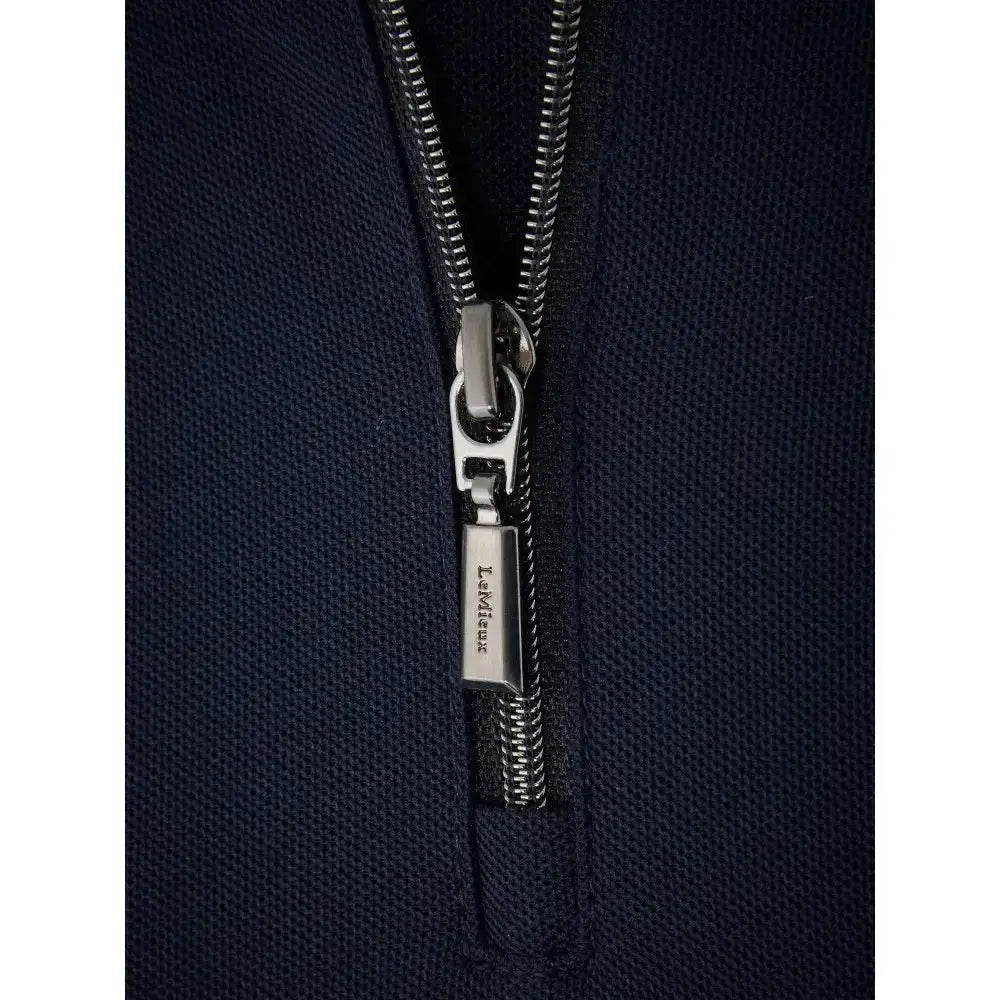 Navy lemieux long sleeve sport polo shirt with silver levi’s zipper pull on a navy blue zippered jacket