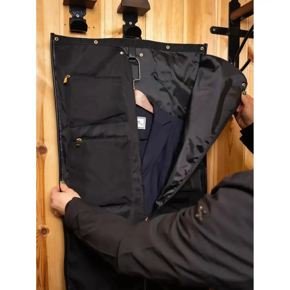 Black lemieux luxe jacket duffle bag made of fabric with generous capacity pockets and hanging hook for clothes storage