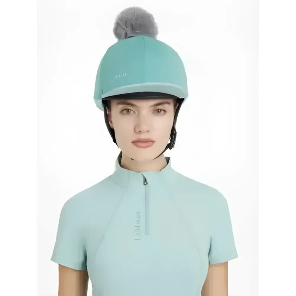 Mint green lemieux maria mesh hat silk lagoon with gray faux fur pom pom perfect for equestrian style