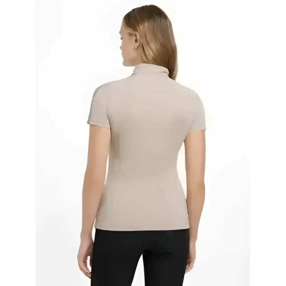 Beige lemieux maria mesh short sleeve baselayer with smooth fitted fabric and a cozy turtleneck design