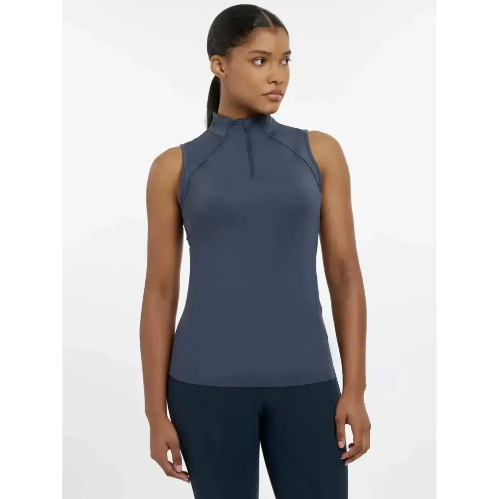 A sleek navy blue lemieux maria mesh sleeveless baselayer dusk blue with high collar and subtle seam detailing