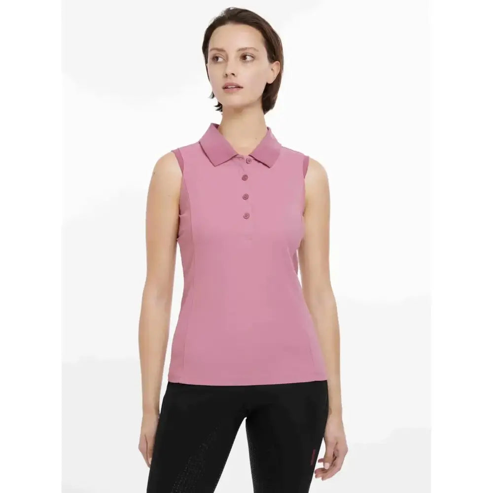A soft pink lemieux marissa sleeveless polo peony with classic collar and matching buttons perfect for summer wear