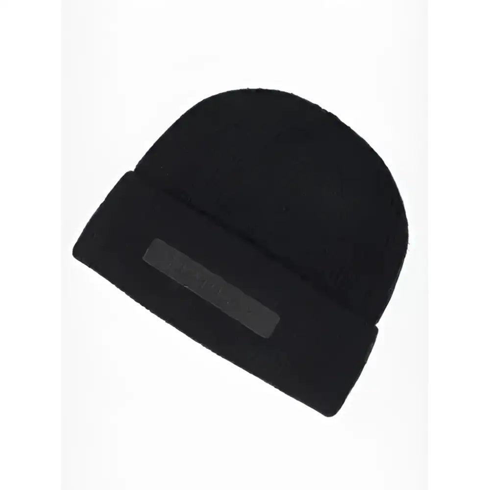Black knitted lemieux mens beanie with ribbed cuff and subtle rectangular logo patch for everyday wear
