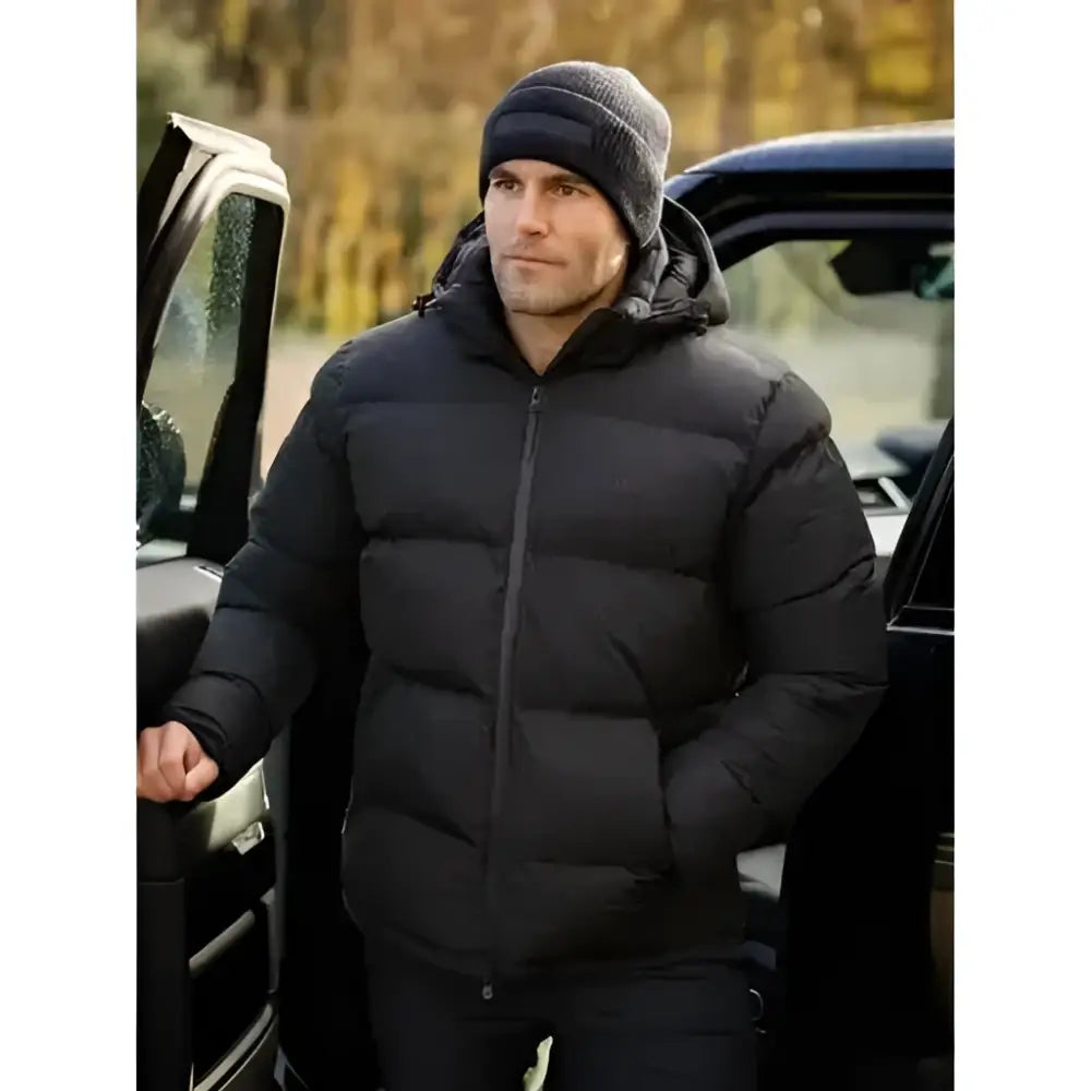 Black puffer jacket with hood and front zipper shown with lemieux mens beanie black for casual outdoor use