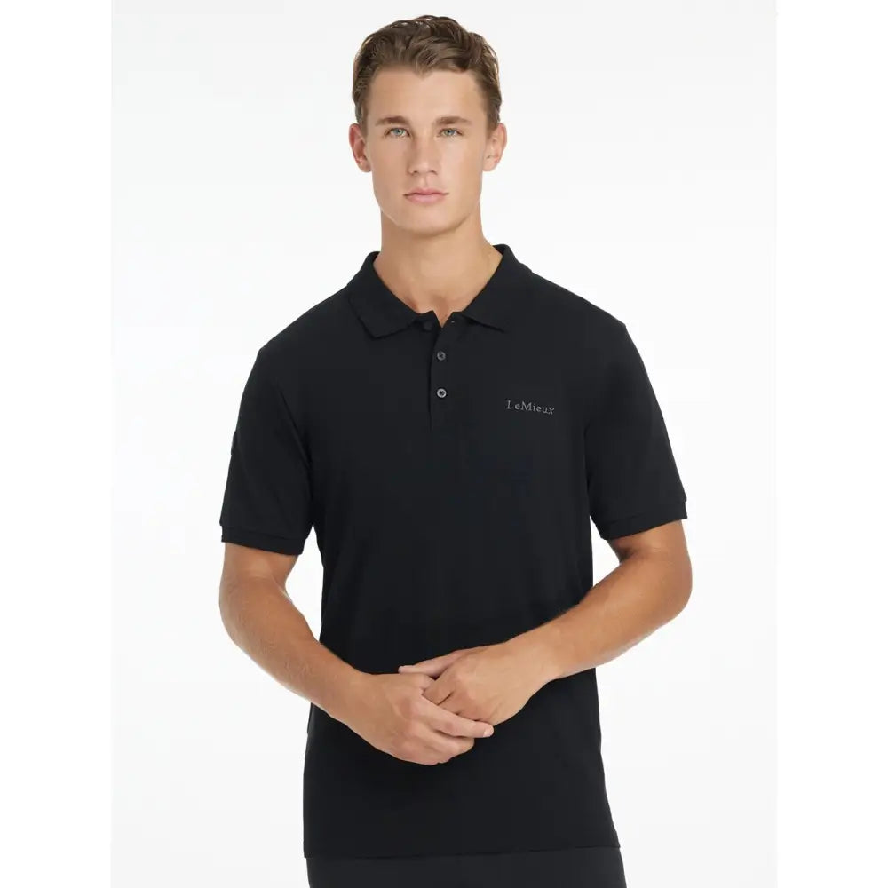 Black lemieux classique polo shirt with subtle embroidered logo on chest for a sleek casual look